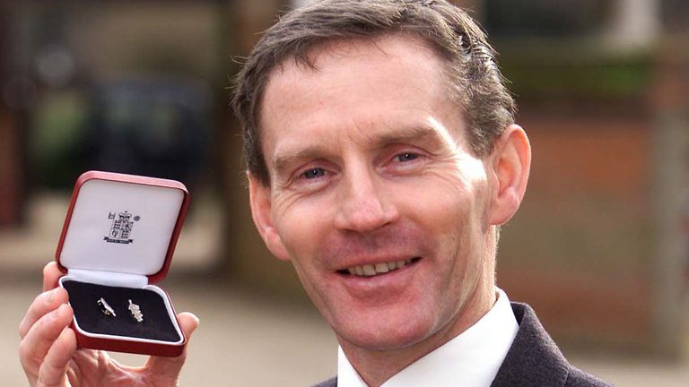 Former jockey Ray Cochrane, 44, holds The Queen's Commendation For Bravery Presented to him by a representative of Queen Elizabeth II at Newmarket, Suffolk, in recognition of the courage he showed when he rescued fellow rider Frankie Dettori.  *... from the wreckage of a crashed plane. Mr Cochrane dragged Mr Dettori away from the light aircraft and tried in vain to save the life of pilot Patrick Mackey, 52, following the crash at Newmarket in June 2000.