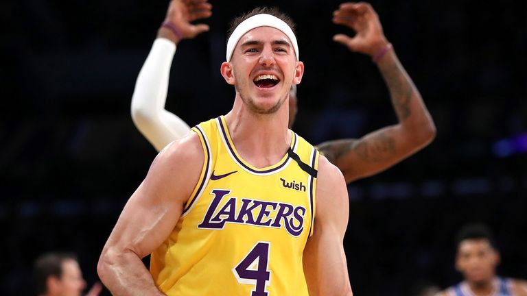 Alex Caruso celebrates a basket during a Lakers-Knicks game