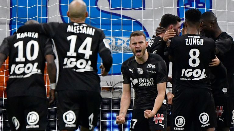 Amiens drew away at second-placed Marseille in their final game before the suspension of the Ligue 1 season