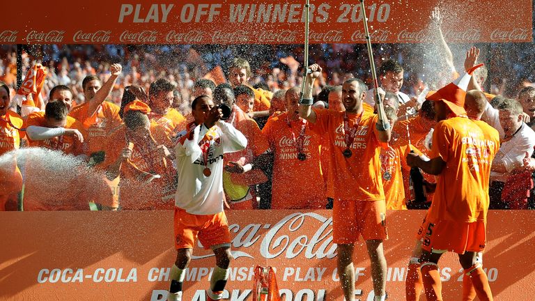 The Blackpool Team celebrate promotion to the Premier League after victory in the Coca-Cola Championship Playoff Final between Blackpool and Cardiff City at Wembley Stadium on May 22, 2010
