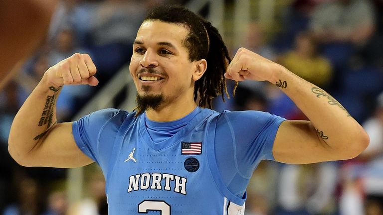 Cole Anthony flexes in celebration during a North Carolina game