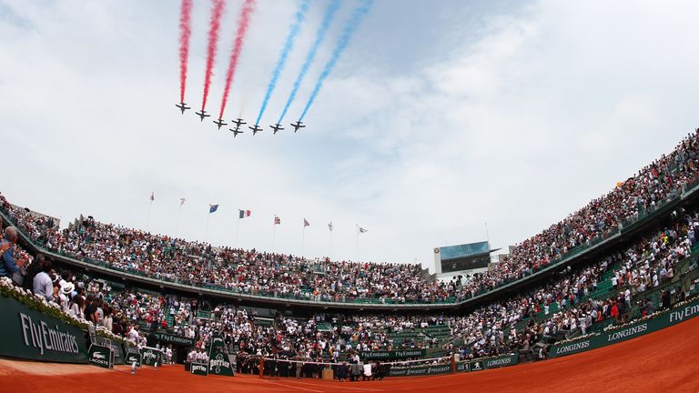 A general view as planes fly above court Philippe Chatrier leaving the colours of the French flag, prior to the mens singles final between Rafael Nadal of Spain and Dominic Thiem of Austria during day fifteen of the 2018 French Open at Roland Garros on June 10, 2018 in Paris, France