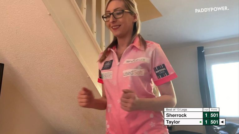 Fallon Sherrock celebrates during her charity match against Phil Taylor