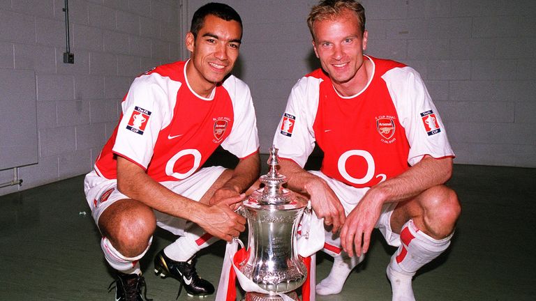 Dennis Bergkamp and Giovanni van Bronckhorst with the F.A.Cup after victory over Southampton in the 2003 final