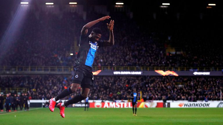 Club Brugge's Nigerian forward Dennis Emmanuel Bonaventure celebrates scoring his team's first goal, during the UEFA Europa League round of 32 first leg, football match between Club Brugge's and Manchester United, at the Jan Breydel Stadium in Bruges on February 20, 2020. (Photo by Adrian DENNIS / AFP) (Photo by ADRIAN DENNIS/AFP via Getty Images)