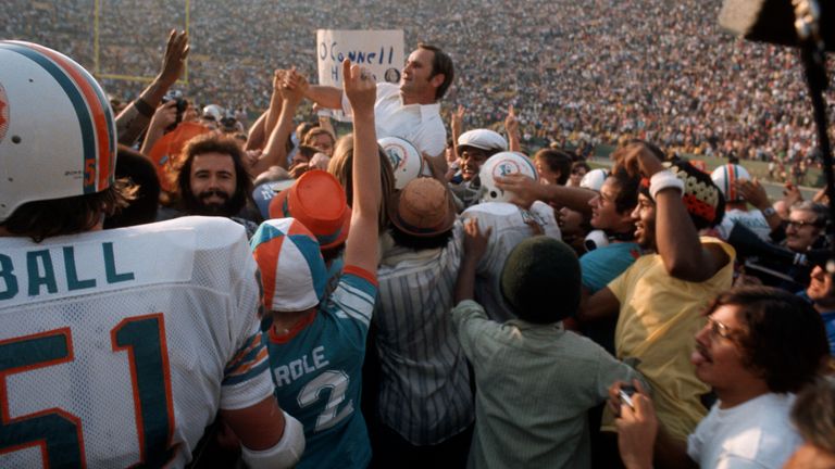 Don Shula gets carried off the field by his Dolphins players after they defeated the Washington Redskins in Super Bowl VII on January 14, 1973 