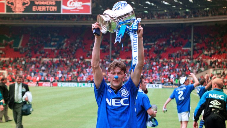 Used substitute Duncan Ferguson celebrates with the FA Cup at Wembley