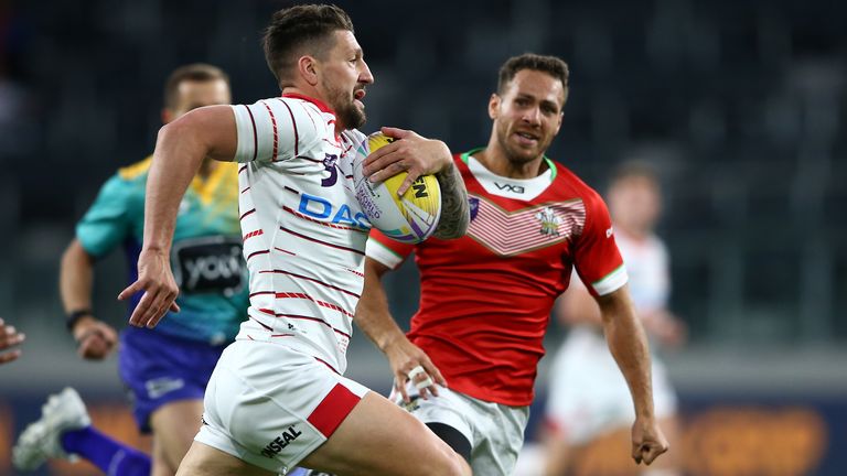 Gareth Widdop of England is tackled during the round one Rugby League World Cup 9s match against Wales at Bankwest Stadium on October 18, 2019 in Sydney, 