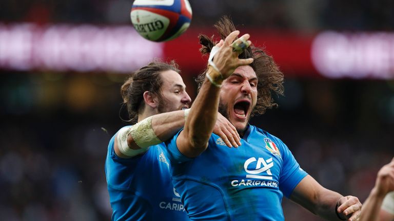 Italy's wing Giovanbattista Venditti (R) celebrates with Italy's centre Michele Campagnaro (L) after scoring a try