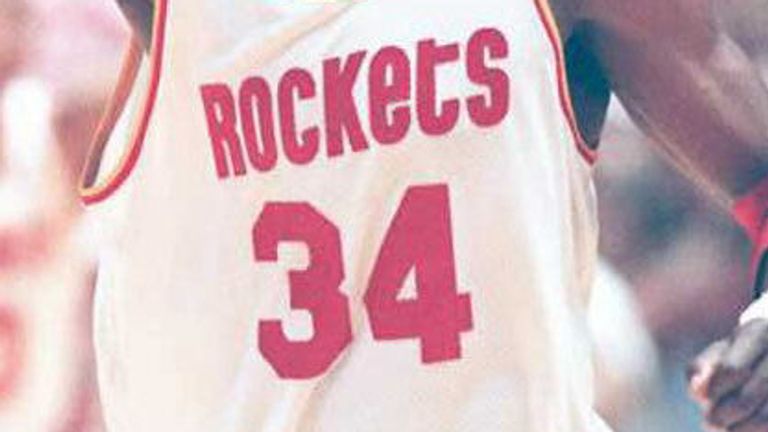 Hakeem Olajuwon wearing his No 34 Houston Rockets jersey
