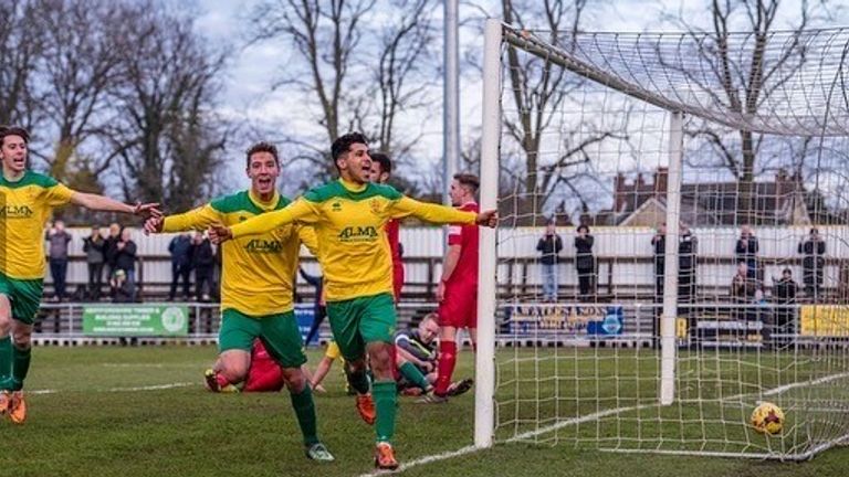 Jhai Dhillon celebrates while playing for Hitchin Town