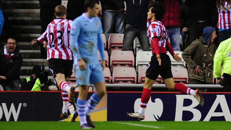 Ji Dong-Won celebrates his famous late winner at the Stadium of Light