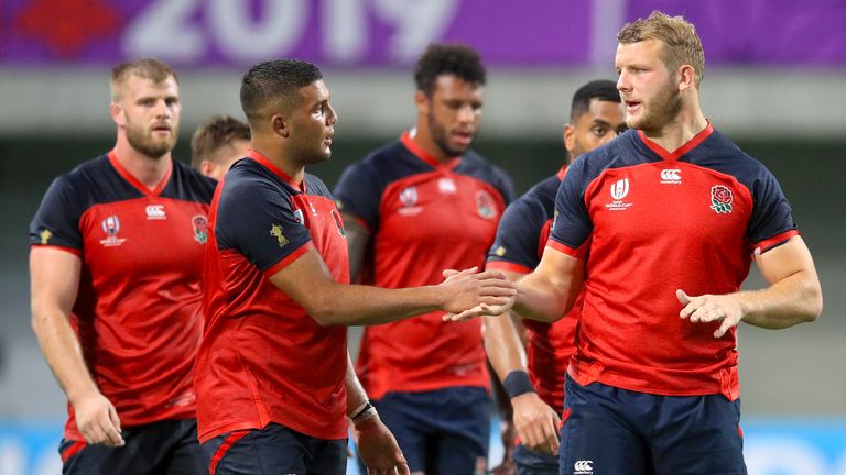 England's Joe Launchbury (centre right) shakes hands with Lewis Ludlam 