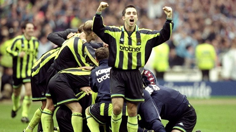 Somewhere at the bottom of that pile, Nicky Weaver... after his penalty shootout save sent Manchester City into the old  First Division 