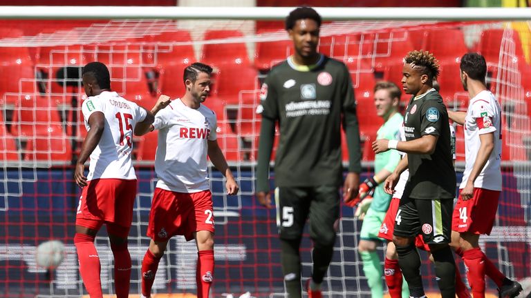 Mark Uth celebrates giving Cologne an early lead over Mainz on Sunday