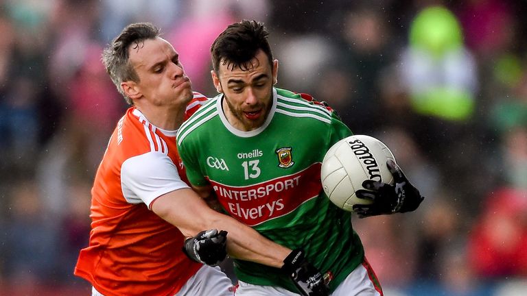 Kevin McLoughlin of Mayo in action against Mark Shields of Armagh