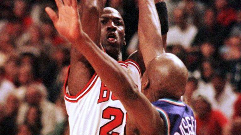 Michael Jordan shoots over Bryon Russell