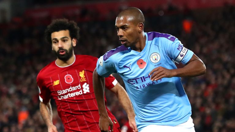 Mohamed Salah and Fernandinho in action during Liverpool's 3-1 win against Manchester City in November