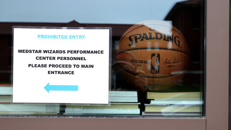 A sign directing essential workers at the Washington Wizards training facility