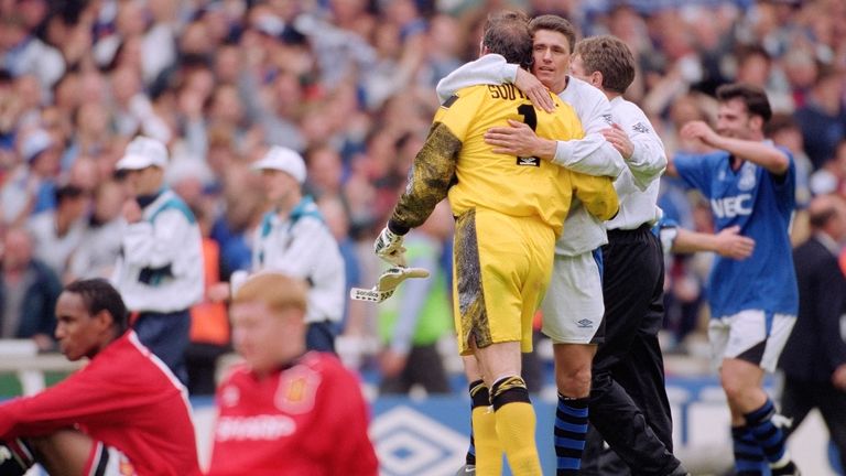 Everton's matchday heroes Rideout and Southall embrace on the pitch