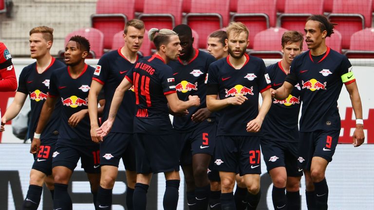 Yussuf Poulsen is congratulated after scoring on his 250th RB Leipzig appearance