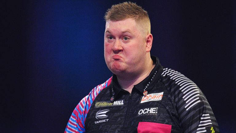 Ricky Evans of England reacts in his Third Round match against Michael van Gerwen of The Netherlands during Day Ten of the 2020 William Hill World Darts Championship at Alexandra Palace on December 22, 2019 in London, England. 