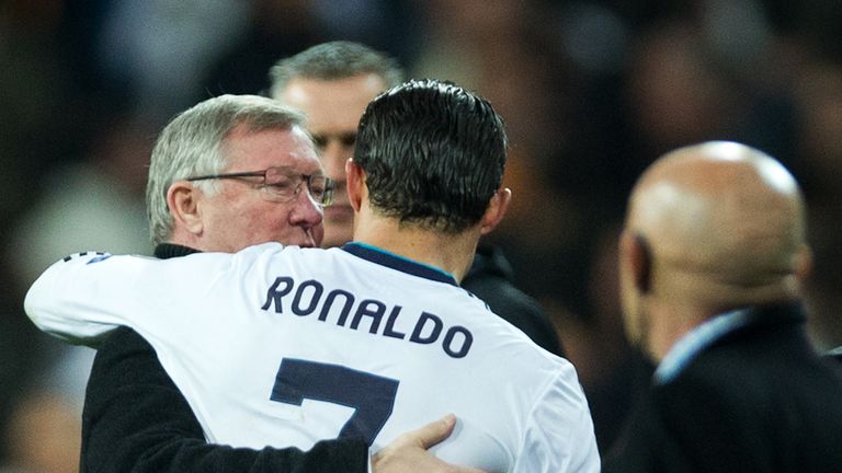Ferguson and Ronaldo embrace after the match at the Bernabeu in 2013