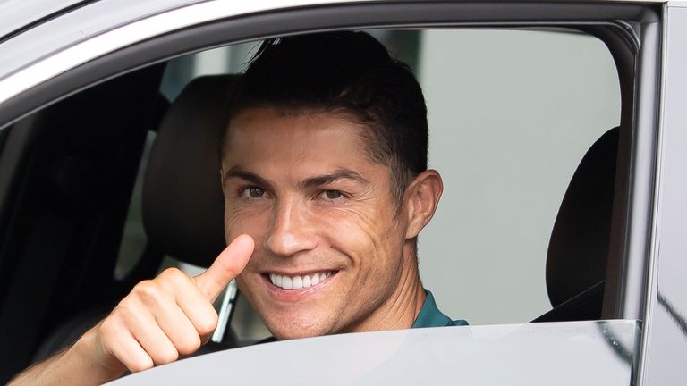 Juventus' Portuguese forward Cristiano Ronaldo exit in his car to resume training after a quarantine on May 19, 2020 at the club's Continassa training ground in Turin, as the country's lockdown is easing after over two months, aimed at curbing the spread of the COVID-19 infection, caused by the novel coronavirus.