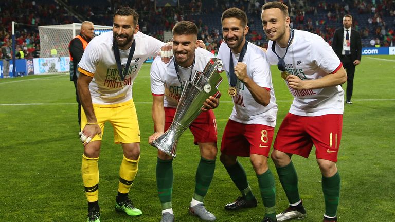 Wolves players Rui Patricio, Ruben Neves, Joao Moutinho and Diogo Jota with the Nations League trophy