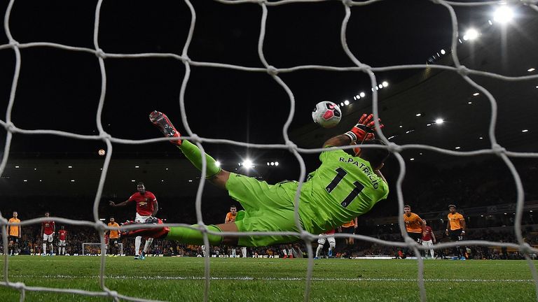 Rui Patricio of Wolves saves a penalty from Paul Pogba of Manchester United at Molineux