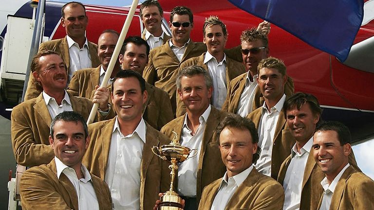 LONDON - SEPTEMBER 13:  European Ryder Cup Captain Bernhard Langer (R) and Paul McGinley hold the Ryder cup as the European Ryder Cup team leave England for the USA, on September 13, 2004 in London.  (Photo by Andrew Redington/Getty Images) *** Local Caption *** Bernhard Langer