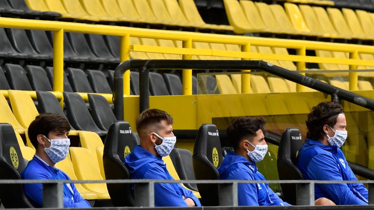 Schalke's subs wore facemasks and kept to social distancing guidelines