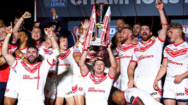  Lachlan Coote of St Helens lifts the trophy as he celebrates his team's victory after the Betfred Super League Grand Final between St Helens and Salford Red Devils at Old Trafford on October 12, 2019 in Manchester, England