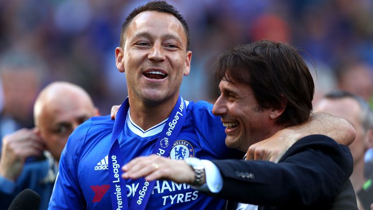 Antonio Conte and John Terry celebrate following the Premier League match between Chelsea and Sunderland at Stamford Bridge on May 21, 2017 in London, England.