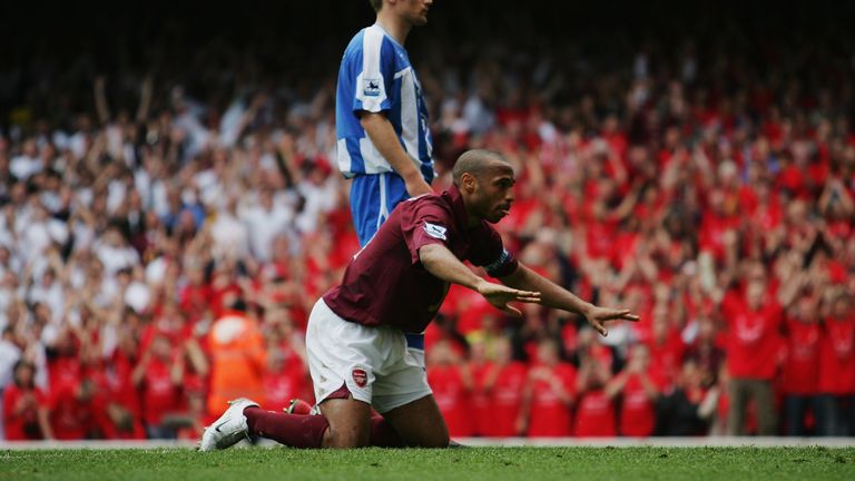 Thierry Henry goes to kiss the ground after his last goal at Highbury in 2006