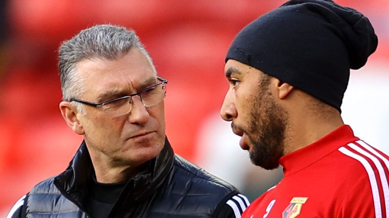 Watford captain Troy Deeney (right) is an influential figure at the Premier League club