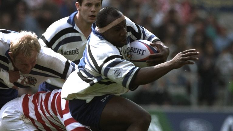 25 May 1996: Victor Ubogu (right) of Bath charges away from the Wigan defence in the Rugby Union leg of the clash of the codes, Rugby Union and League, at Twickenham, London. Bath won 44-19. \ Mandatory Credit: Mike Hewitt/Allsport