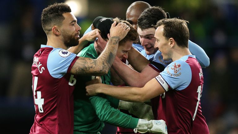 David Martin is congratulated by his West Ham team-mates at Stamford Bridge