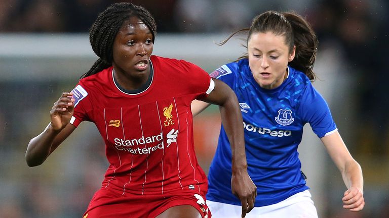 Liverpool&#39;s Rinsola Babajide holds off a challenge from Everton&#39;s Danielle Turner in the Women&#39;s Super League
