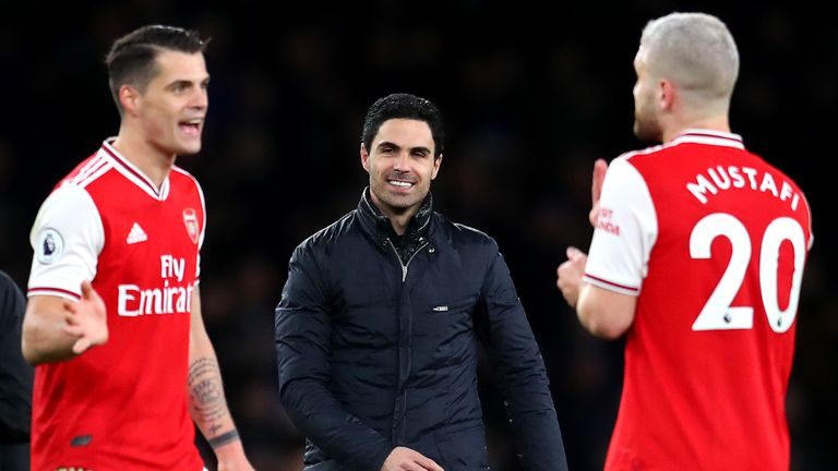 LONDON, ENGLAND - FEBRUARY 23: Mikel Arteta, Granit Xhaka and Shkodran Mustafi of Arsenal celebrate during the Premier League match between Arsenal FC and Everton FC at Emirates Stadium on February 23, 2020 in London, United Kingdom. (Photo by Catherine Ivill/Getty Images)