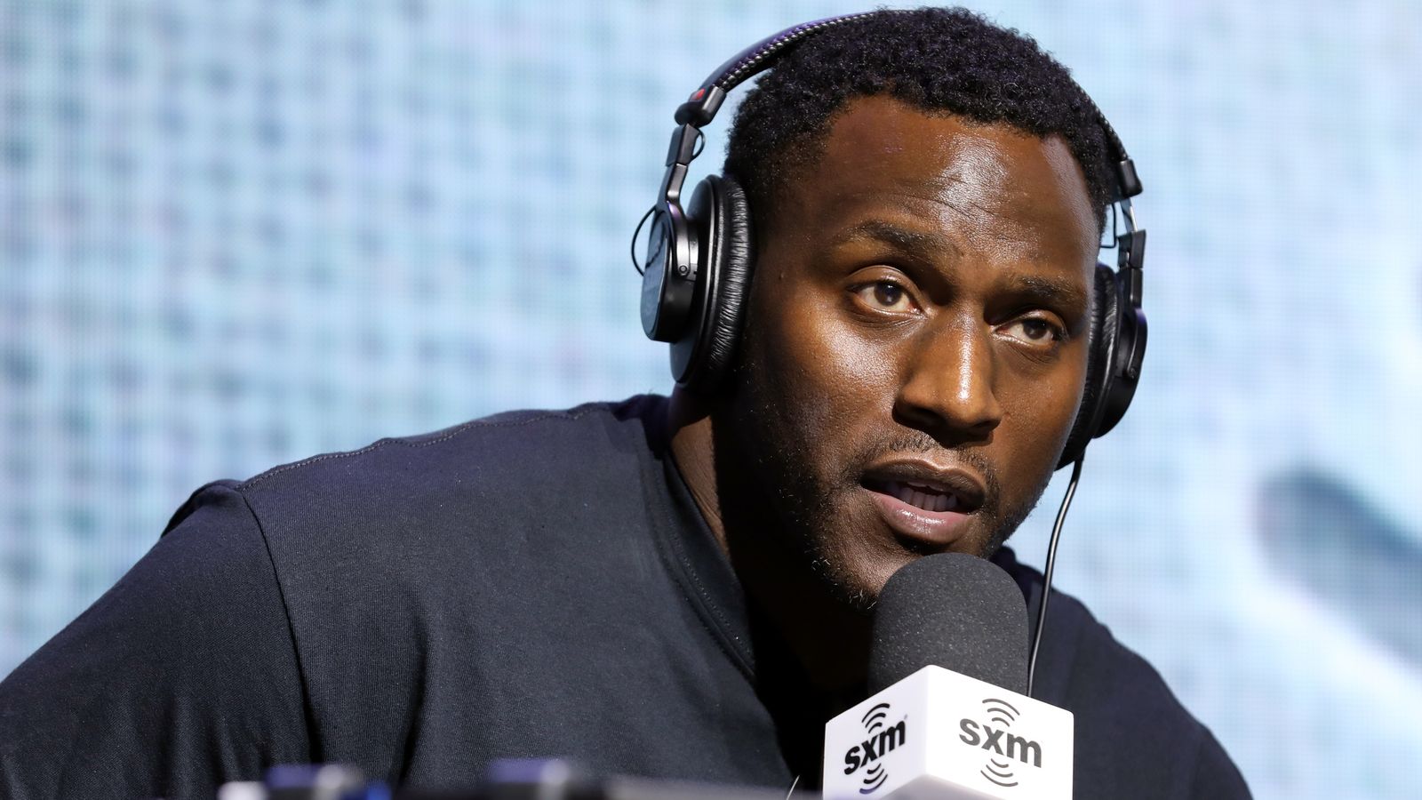 Takeo Spikes gives speech before GHSA title game 