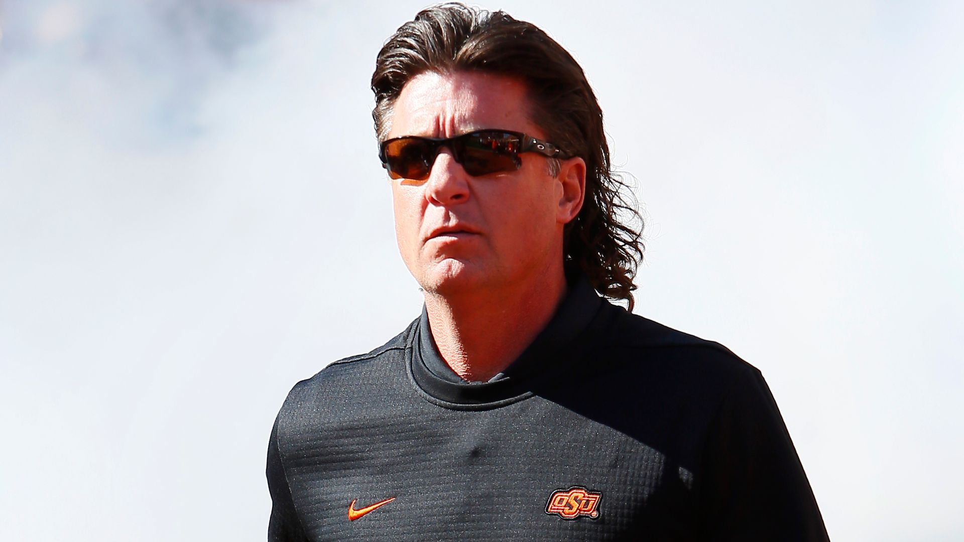 Gundy vows change after being seen in OAN t-shirt