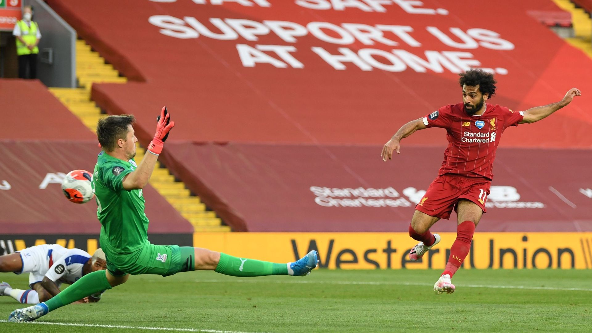 Liverpool thrash Palace to close in on title