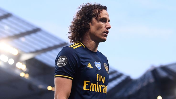 Arsenal's David Luiz walks off after being sent off against Manchester City