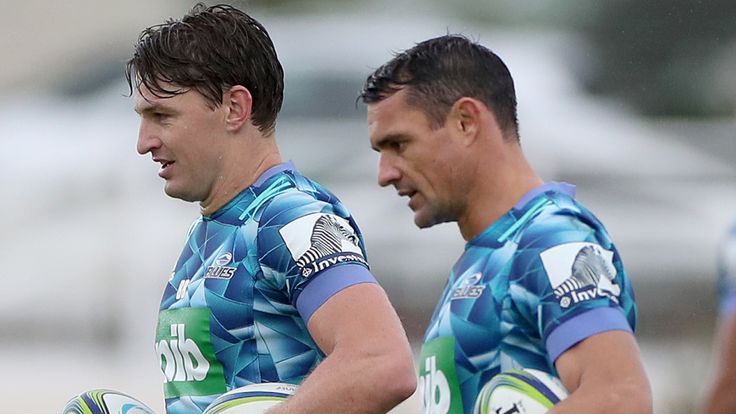 Dan Carter (R) and Beauden Barrett of the Blues run through drills during a training session at Blues HQ