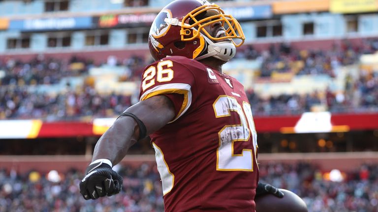 Running back Adrian Peterson #26 of the Washington Redskins celebrates after scoring a touchdown against the Philadelphia Eagles during the fourth quarter at FedExField on December 15, 2019 in Landover, Maryland