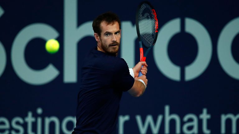 Andy Murray plays a backhand as his coach Jamie Delgado looks on during practice for the Schroders Battle of the Brits at the National Tennis Centre on June 22, 2020 in London, England.