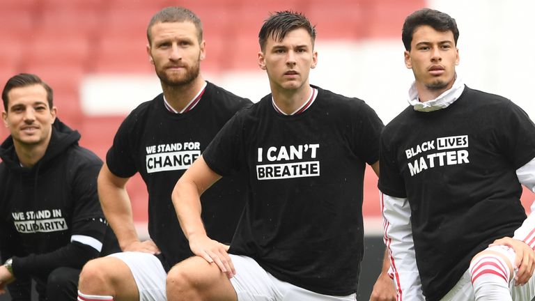 Arsenal's players took a knee and wore t-shirts in support of Black Lives Matter before their friendly against Brentford
