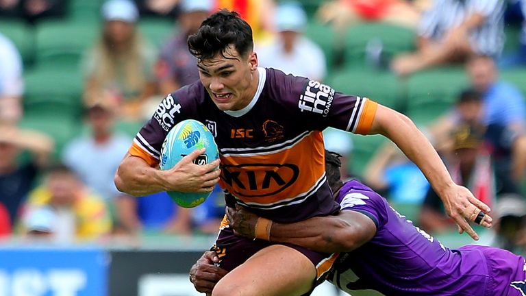 PERTH, AUSTRALIA - FEBRUARY 15: Herbie Farnworth of the Broncos tries to escape the diving tackle of Justin Olam of the Storm during the match between the Broncos and Storm from Day 2 of the 2020 NRL Nines at HBF Stadium on February 15, 2020 in Perth, Australia. (Photo by James Worsfold/Getty Images)