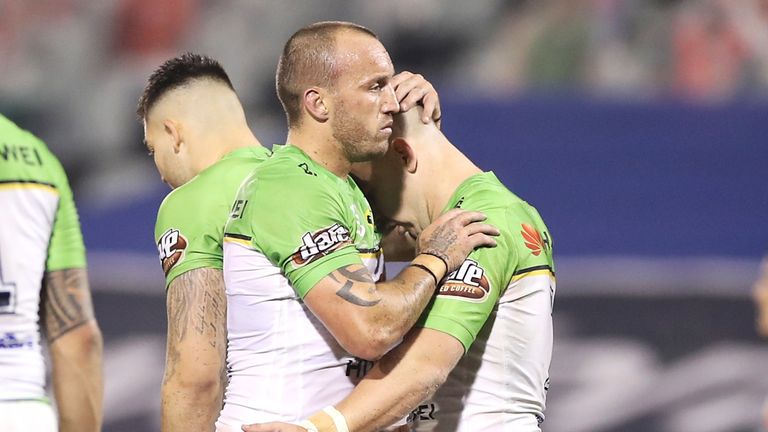 SYDNEY, AUSTRALIA - JUNE 13: Josh Hodgson and George Williams of the Raiders celebrate victory during the round five NRL match between the Wests Tigers and the Canberra Raiders at Campbelltown Stadium on June 13, 2020 in Sydney, Australia. (Photo by Mark Kolbe/Getty Images)